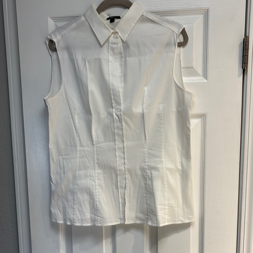 BOSS- Hugo Boss short white sleeve blouse with a zipper on each side.